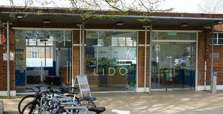 Entrance doors to Brockwell Lido with bikes out front
