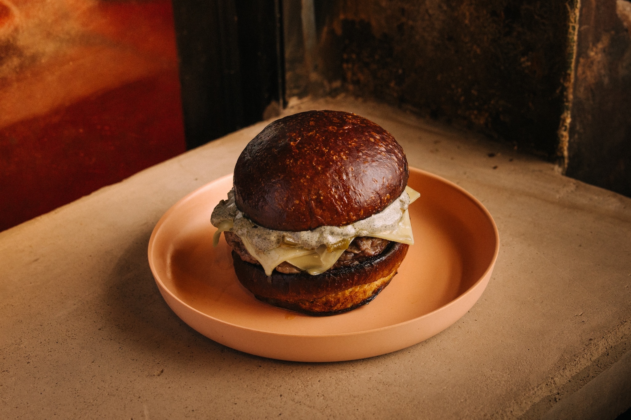 | A burger on a plate