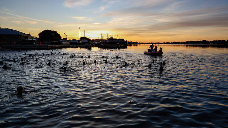 People in water for Winter Solstice Swim at East Gippsland Winter Festival