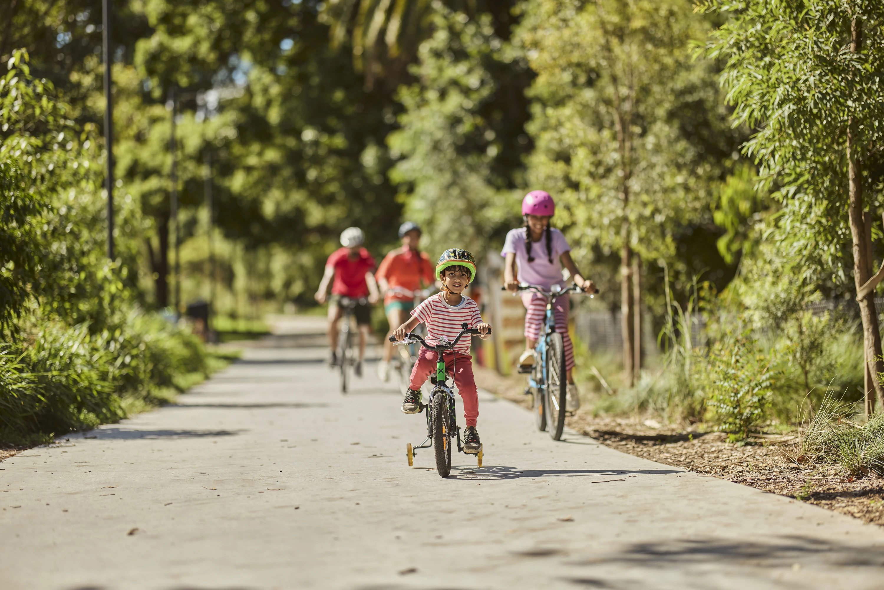 Family cycling on The GreenWay