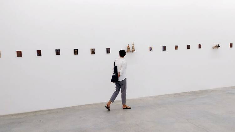 108 Buddhas line up at MOS with Myrtille Tibayrenc