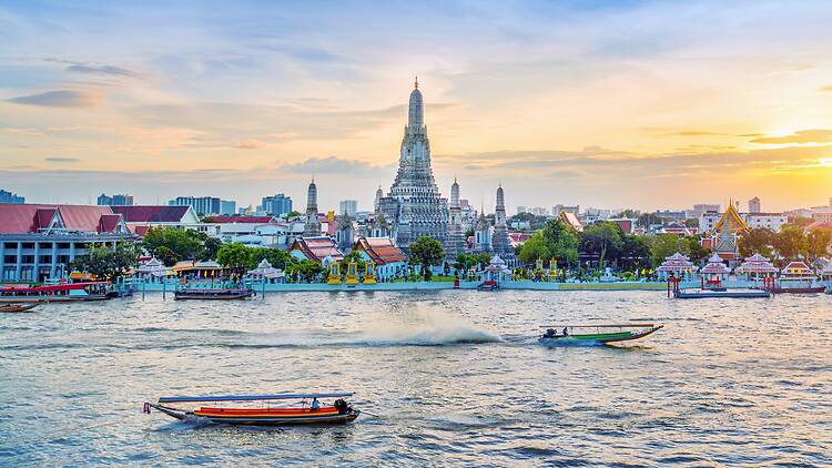Wat Arun Ratchawararam at sunset(Temple of Dawn) famous tourist destination in Bangkok, Thailand.