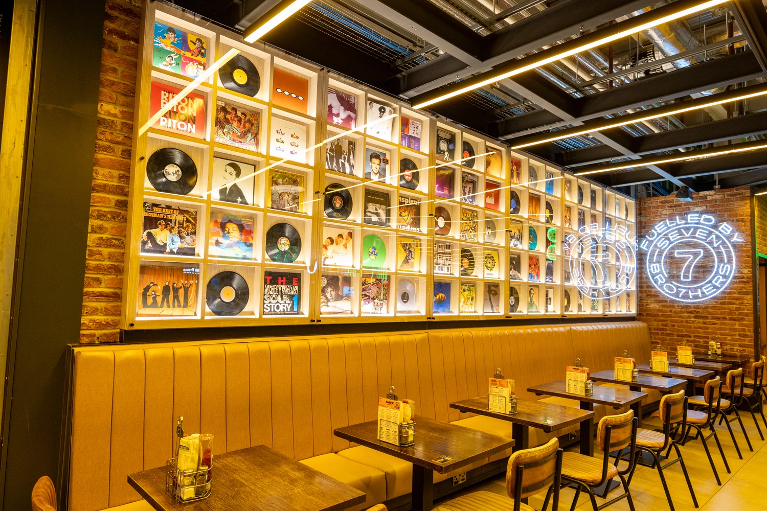 Wall display with records in newly-refurbished Amber Alehouse
