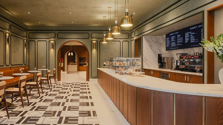 The counter and tables at Sweet July Cafe at Regent Santa Monica Beach Hotel.