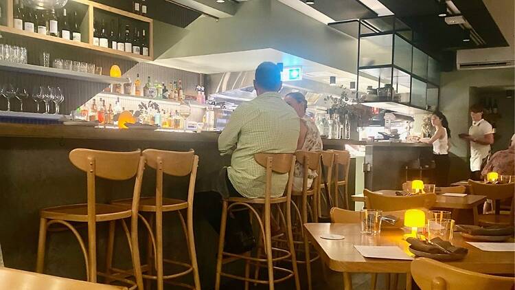 people sitting at the bar in Jules Lane Cove