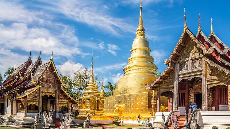 CHIANG MAI, THAILAND - FEBRUARY 1,2024 - Wat Phra Singh Woramahawihan in the streets of Chiang Mai. Chiang Mai, is the largest city in northern Thailand.