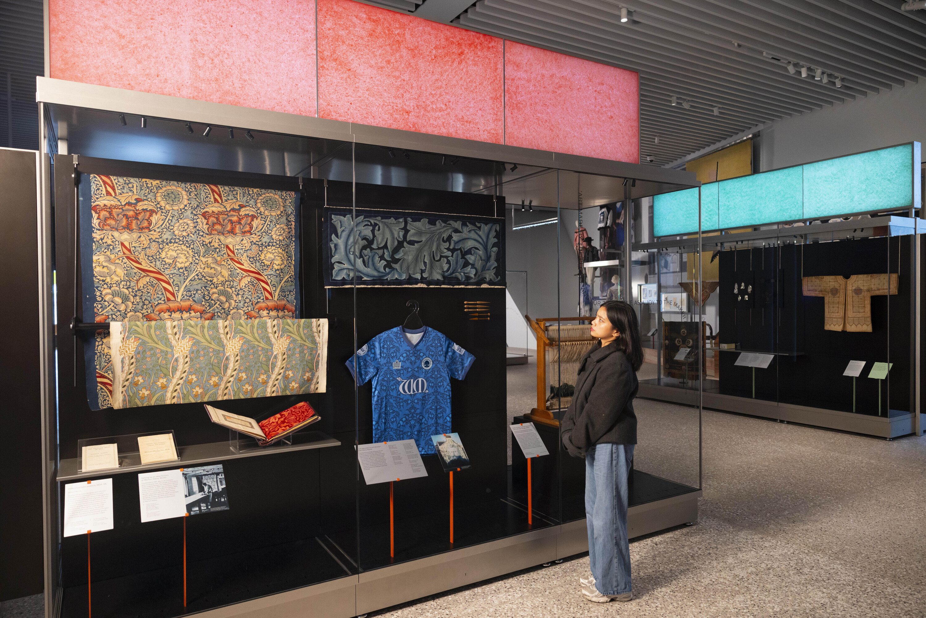 William Morris prints alongside Walthamstow FC William Morris football shirt in the V&A