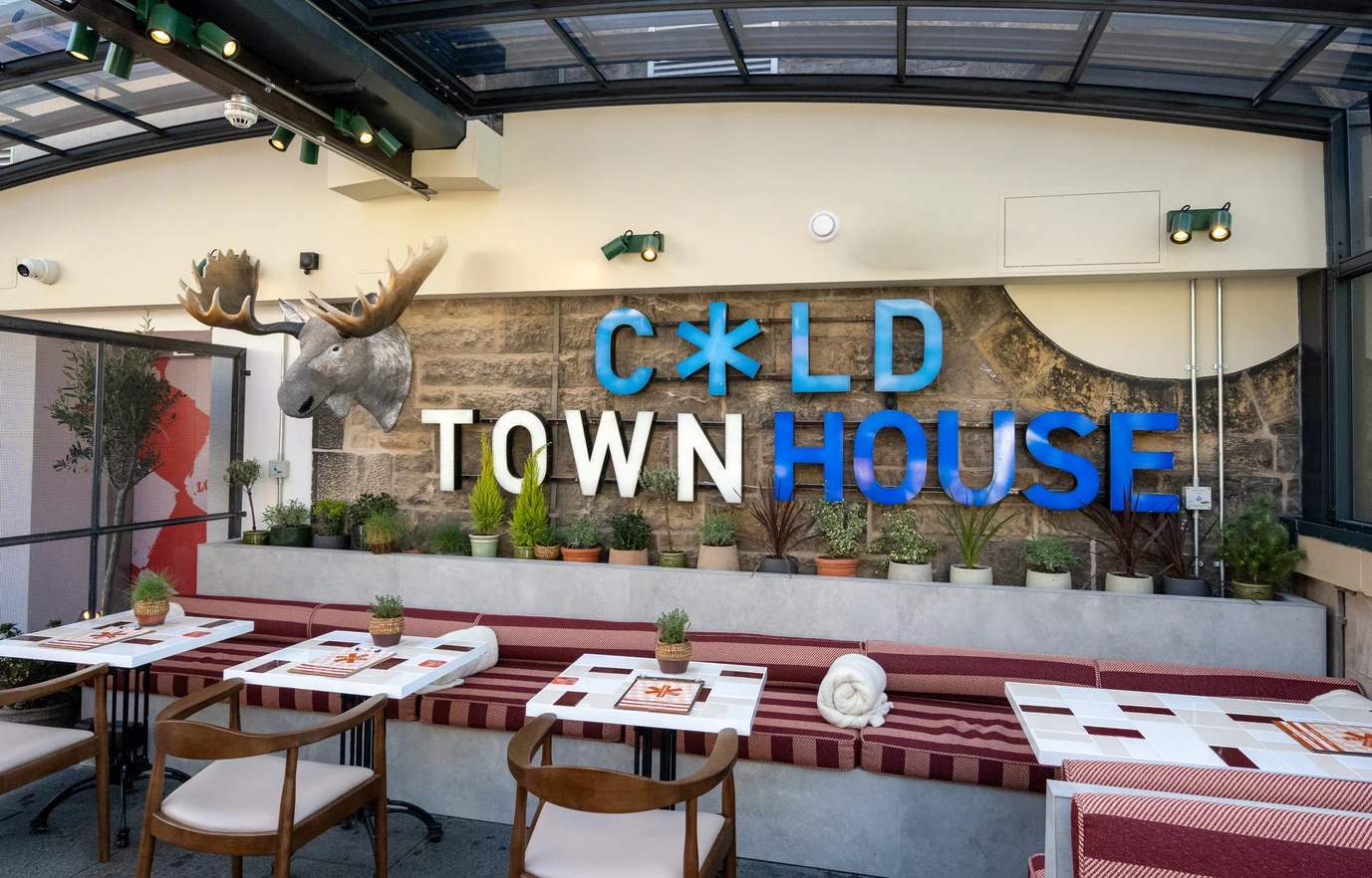 Cold Town House sign with newly-refurbished tables and chairs
