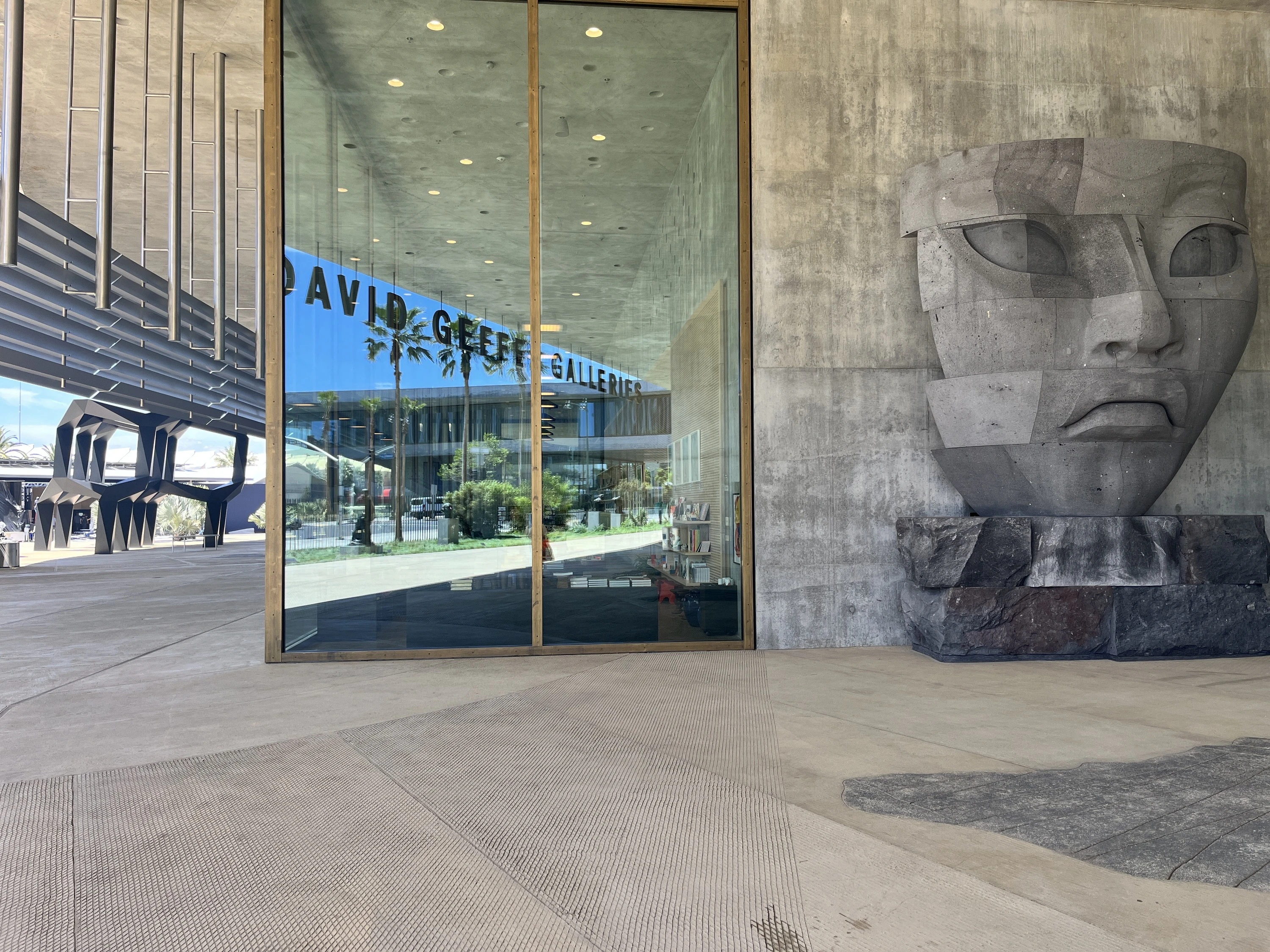 A sculpture of a face outside the LACMA gift shop.