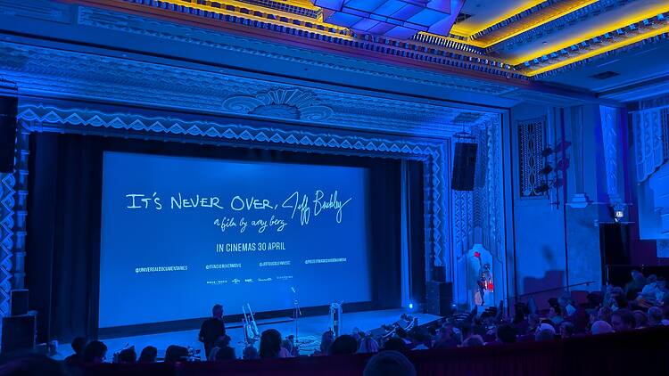 A film screen displaying the opening credits for film 'It's Never Over, Jeff Buckley'