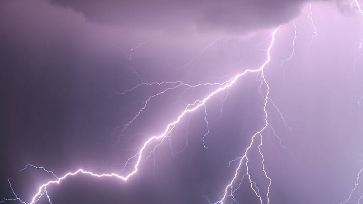 Lightning bolt in the dark night sky in close up