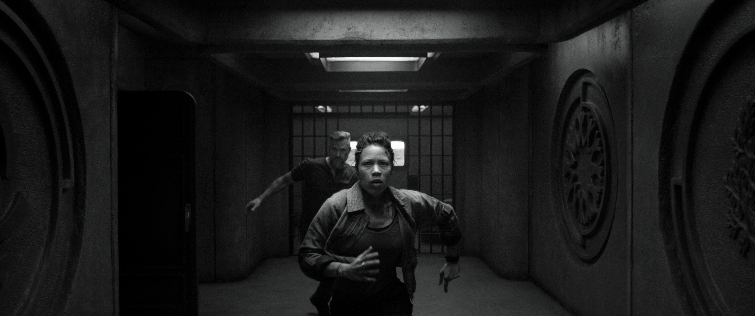 SILO season 3 screencap - characters running