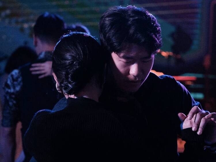 Sway with strangers at a blues dance night at The O.S.S. Bar