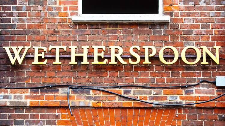 Wetherspoon pub sign in the UK