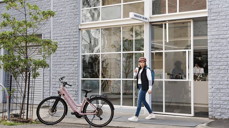 Lady walking to her ebike