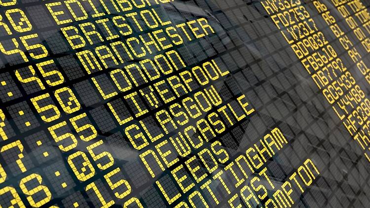 Plane departure board, UK airport