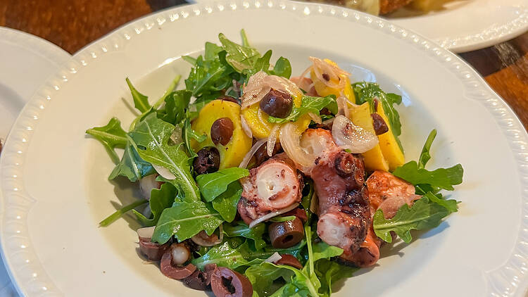 Woodfired octopus with saffron potato and parsley at the Beehive Hotel.