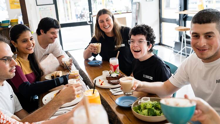 People dining at All Things Equal.