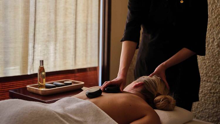 Woman getting a spa treatment at Chuan Spa
