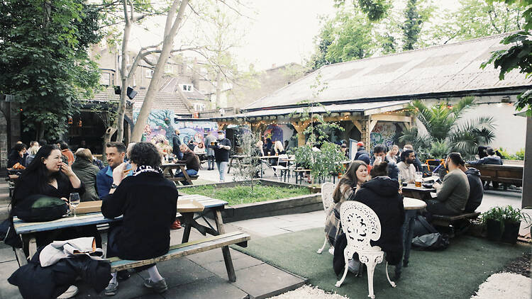 People sat in the Fox & Firkin's beer garden 