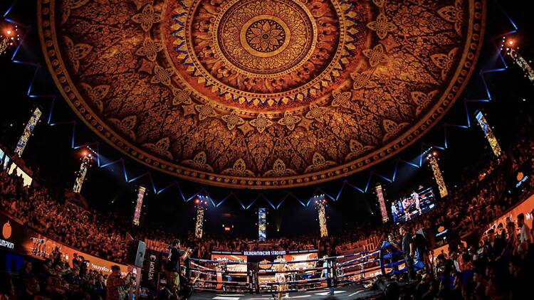 Witness ancient ritual collide with raw brutality at Rajadamnern Stadium's Muay Thai fights