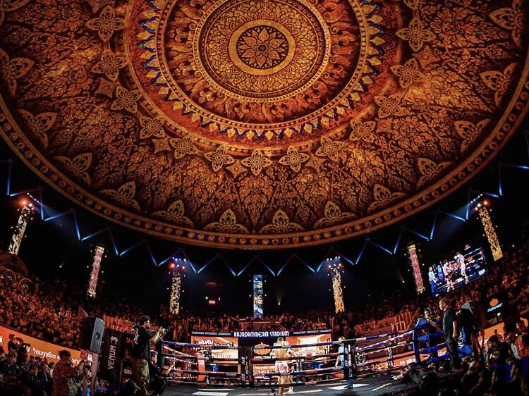 Witness ancient ritual collide with raw brutality at Rajadamnern Stadium's Muay Thai fights