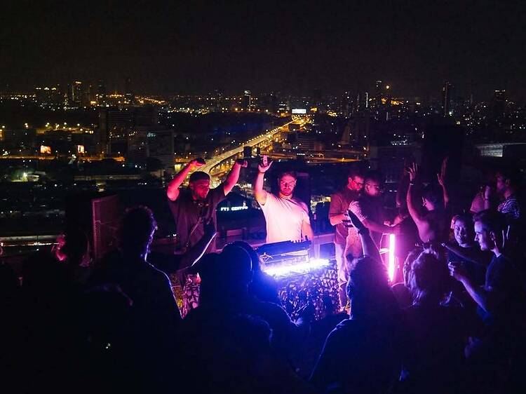 Lose yourself in deep house grooves as the city glows 360 around you