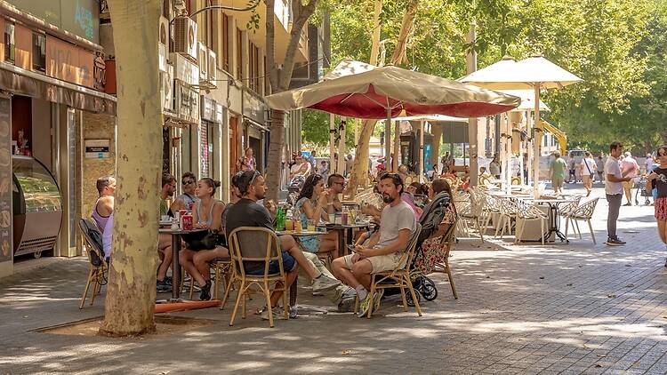 People dining outside in Spain