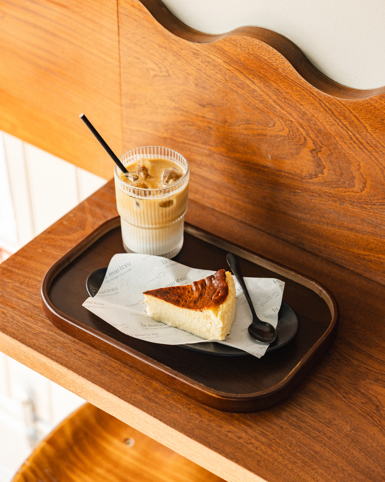 Slice of cheescake and iced coffee