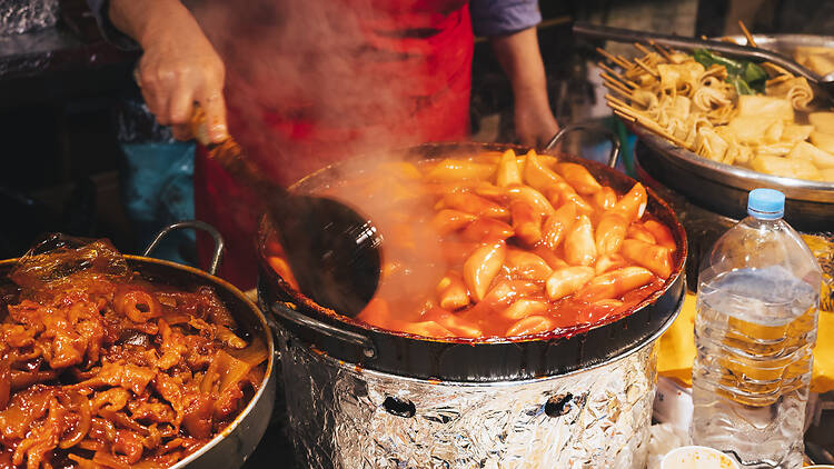 People cooking Tokpokki in pan Traditional Korea Street food
