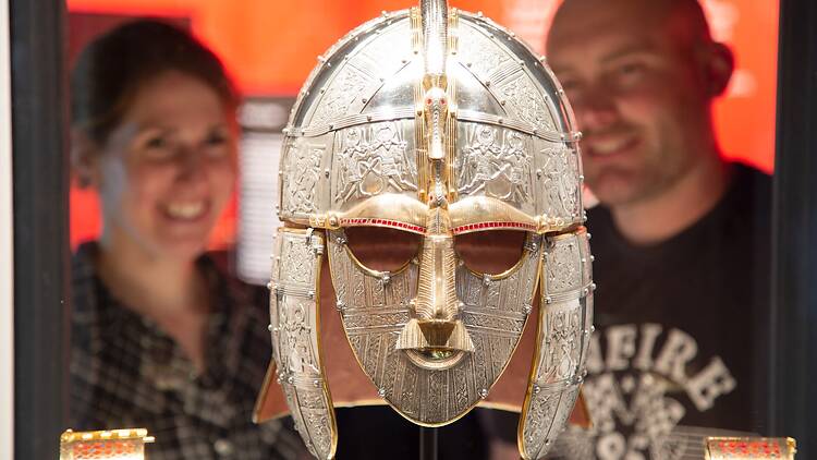 The replica helmet on display in the High Hall at Sutton Hoo, Suffolk, East of England