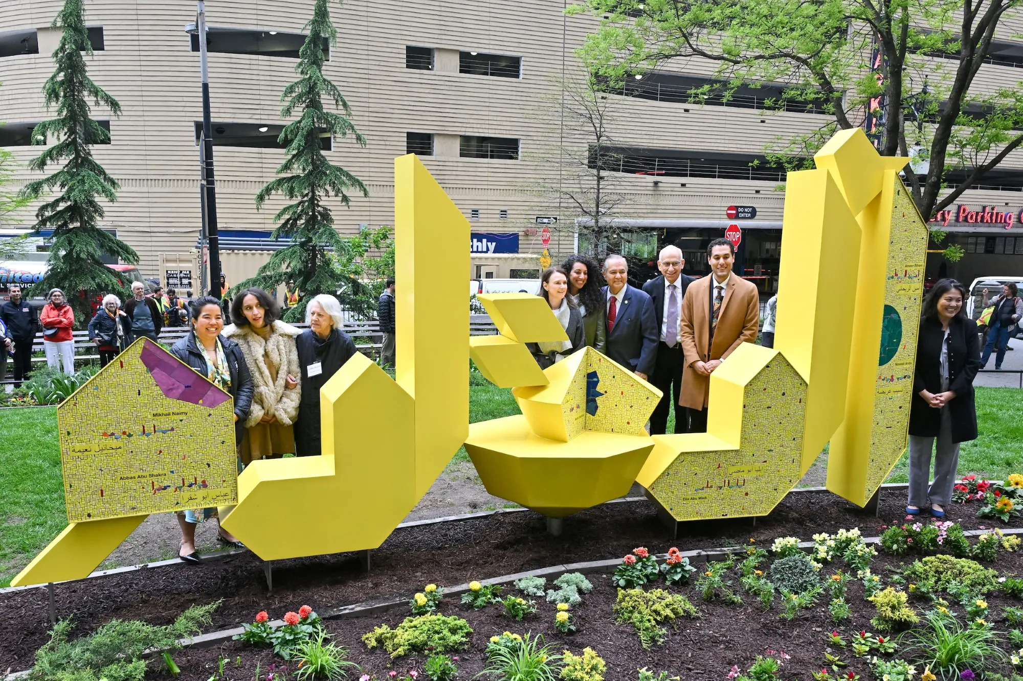 There’s a new bright yellow public artwork in downtown Manhattan that honors the city’s first Arabic-speaking community