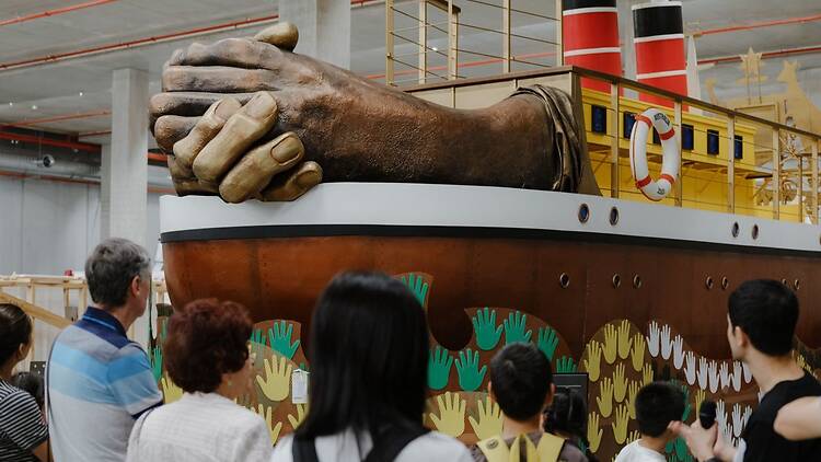 People looking at a museum display