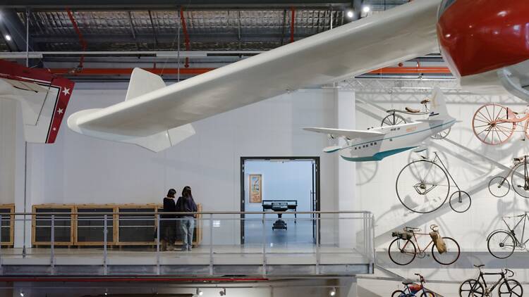 People looking at a museum display