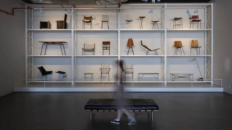 A person walking through a museum exhibit