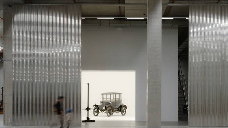 A person walking through a museum exhibit