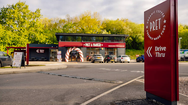 Pret drive-thru sign in front of new roadside shop