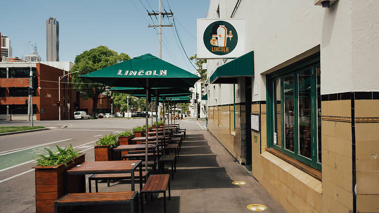 Outside tables at the Lincoln in Carlton.