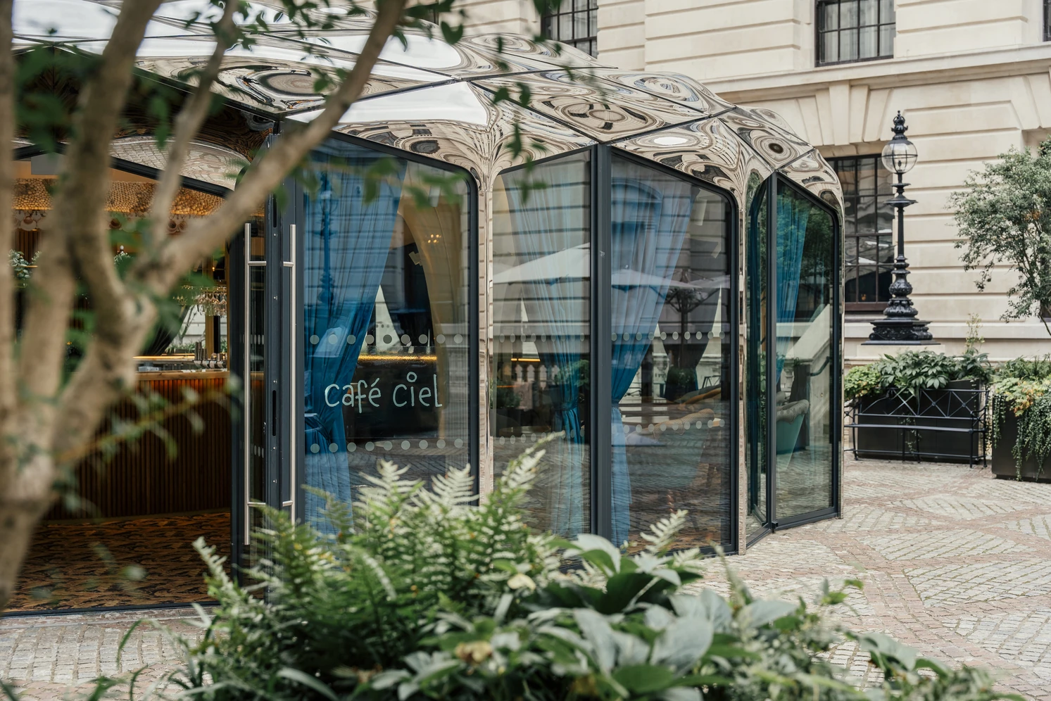 Entranceway and glass walls of Cafe Ciel in The OWO