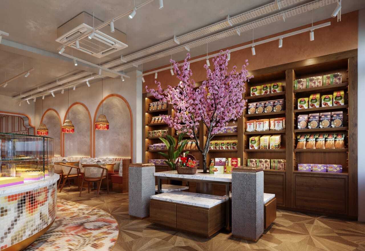 Haldiram's retail space with shelves of packaged sweets and salty snacks