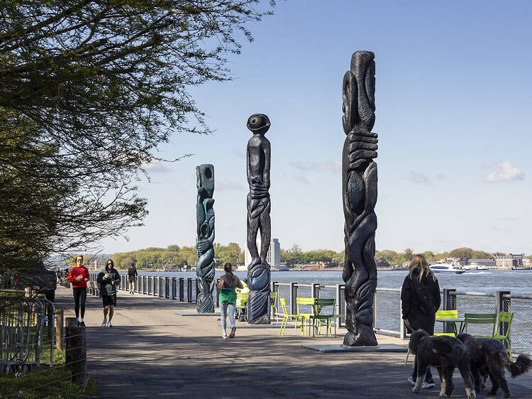 Three enormous totems have been erected in Brooklyn Bridge Park by the water. Here’s what they mean.