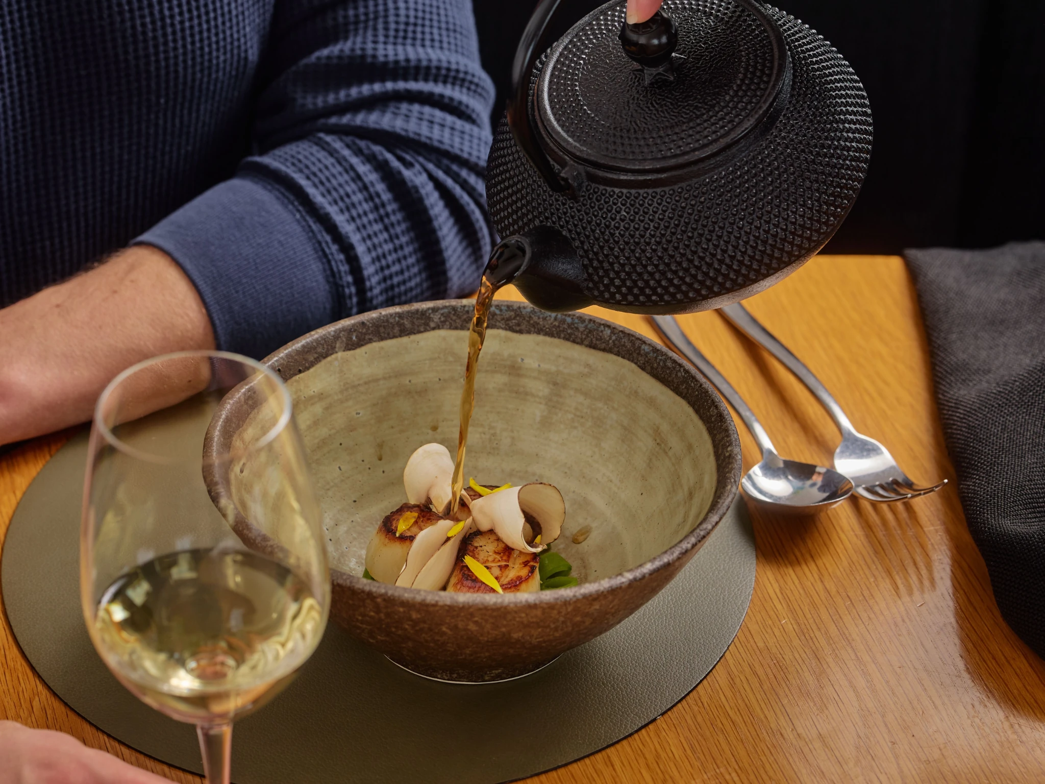 Tea pouring over dish