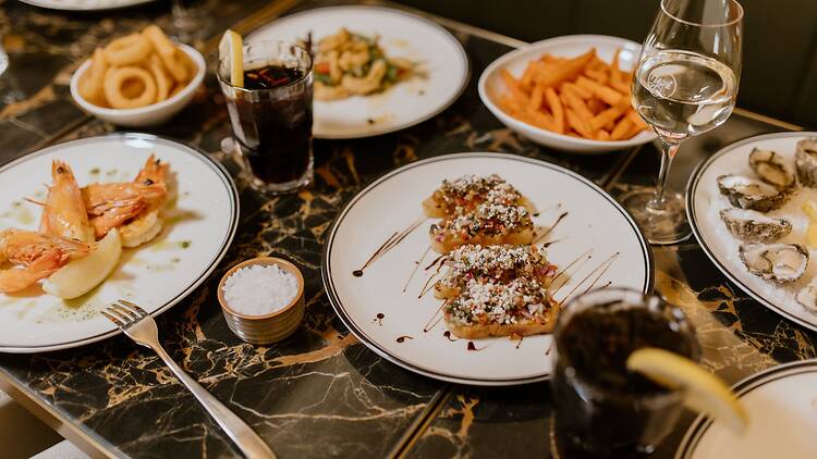 Meza Bar & Grill A table of food
