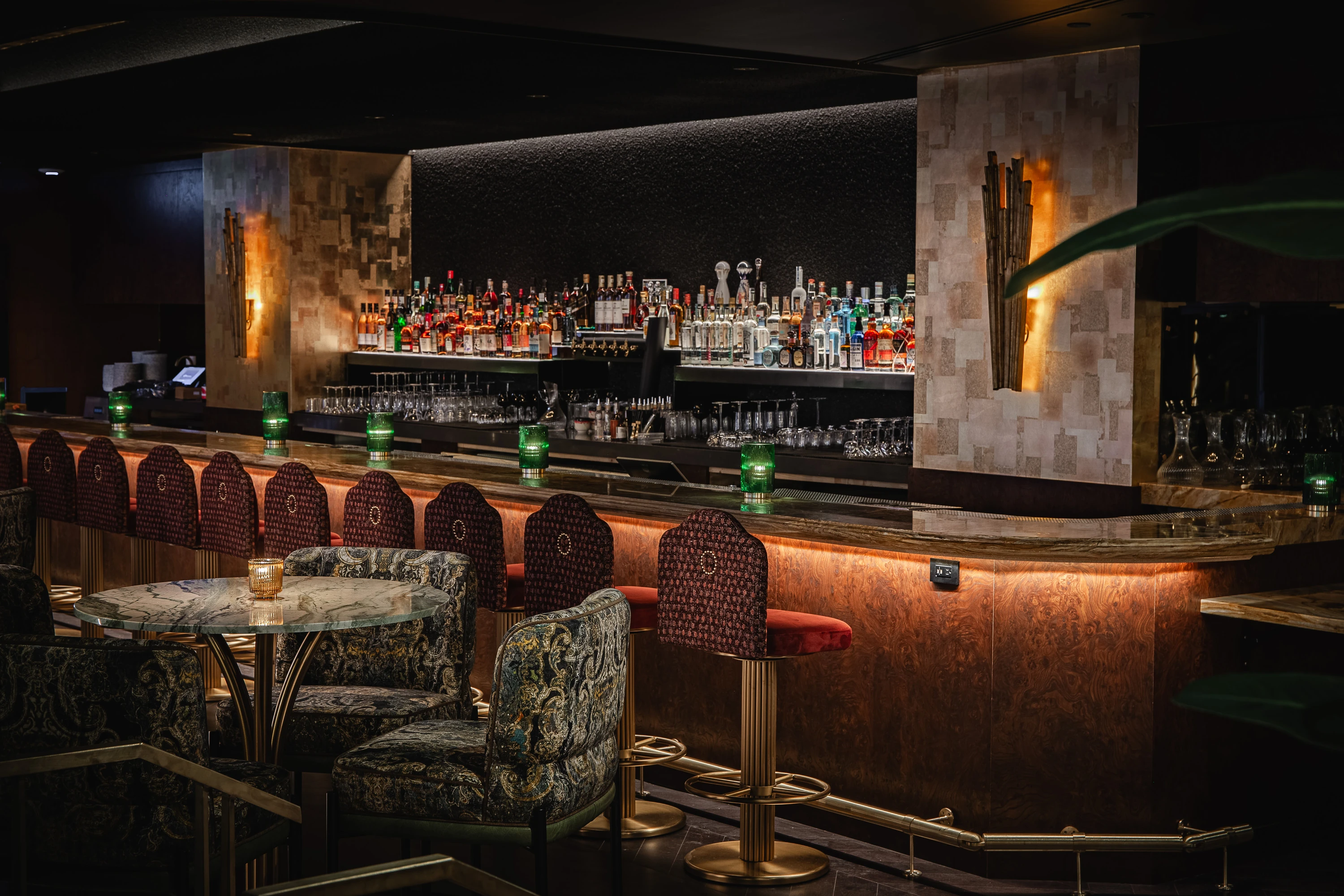 A moody low-lit bar area empty