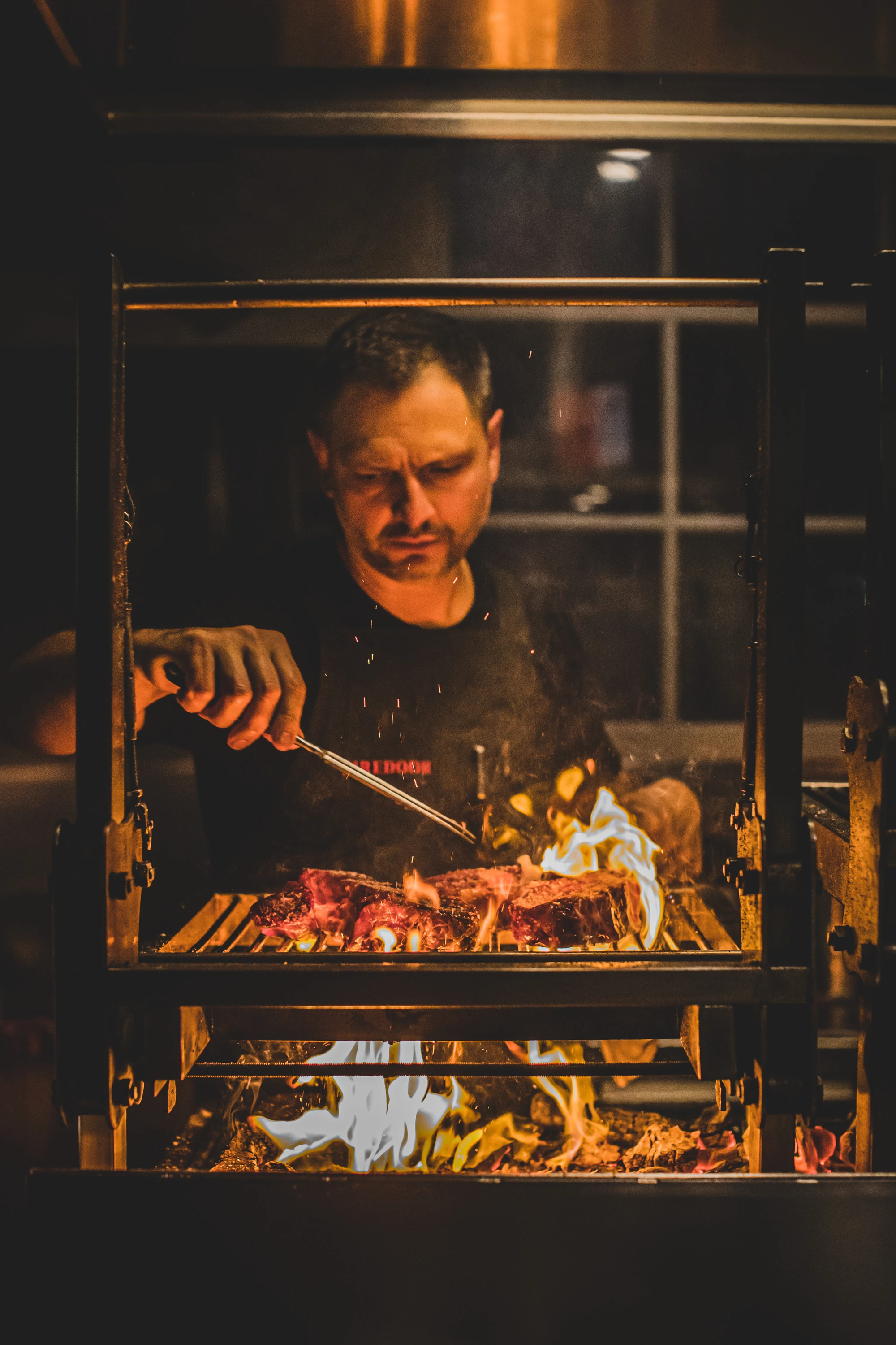 Lennox Hastie, chef at Firedoor and Gildas prepares food