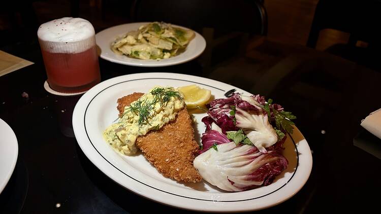 Bar Susanne Fried fish with an egg sauce over it with a radicchio salad