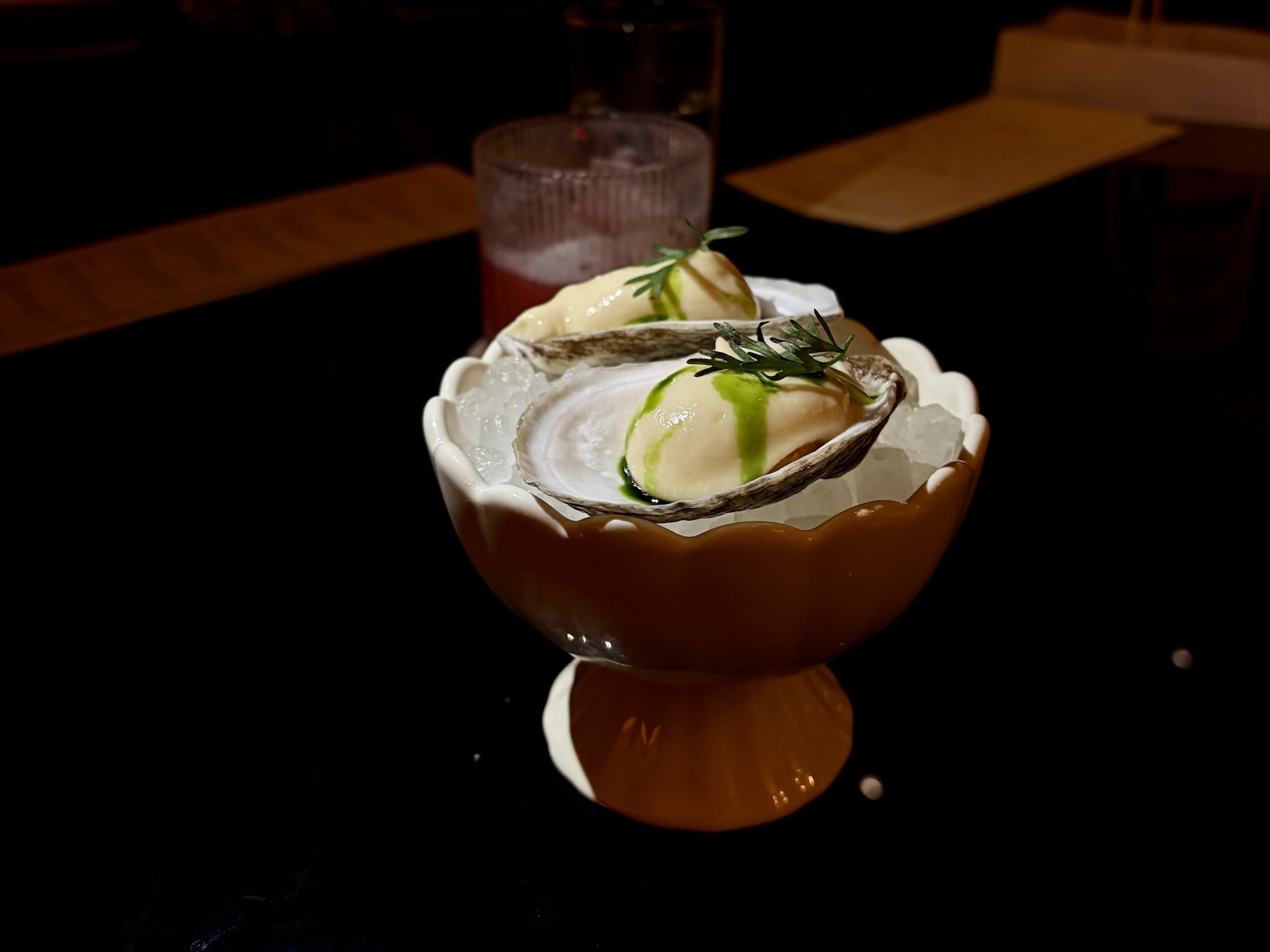 Two dollops of ice cream in a oyster shell