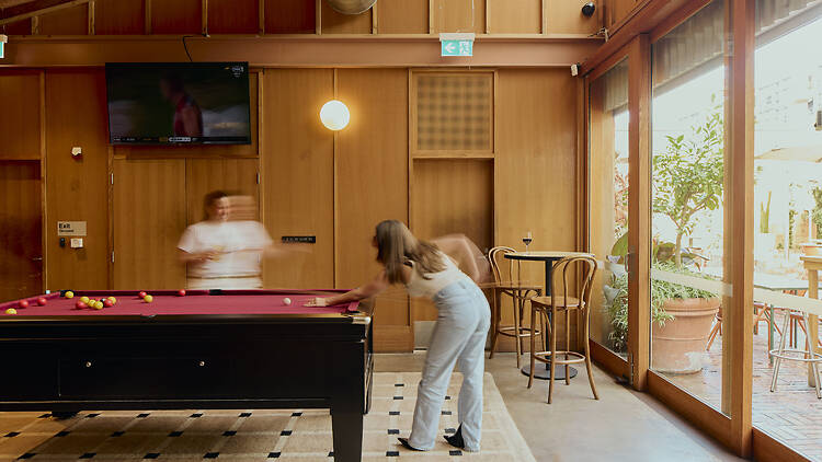 People playing pool.