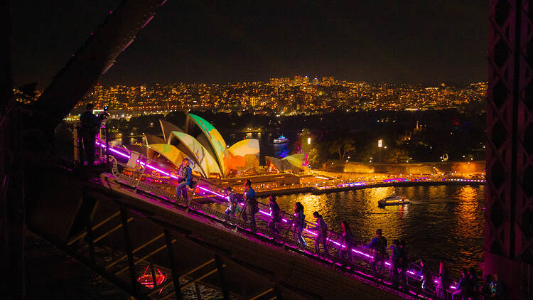 BridgeClimb Sydney Vivid People climbing the Sydney Harbour Bridge during Vivid