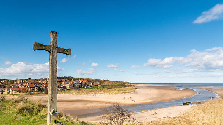 Alnmouth beach with wooden cross Alnmouth beach with wooden cross